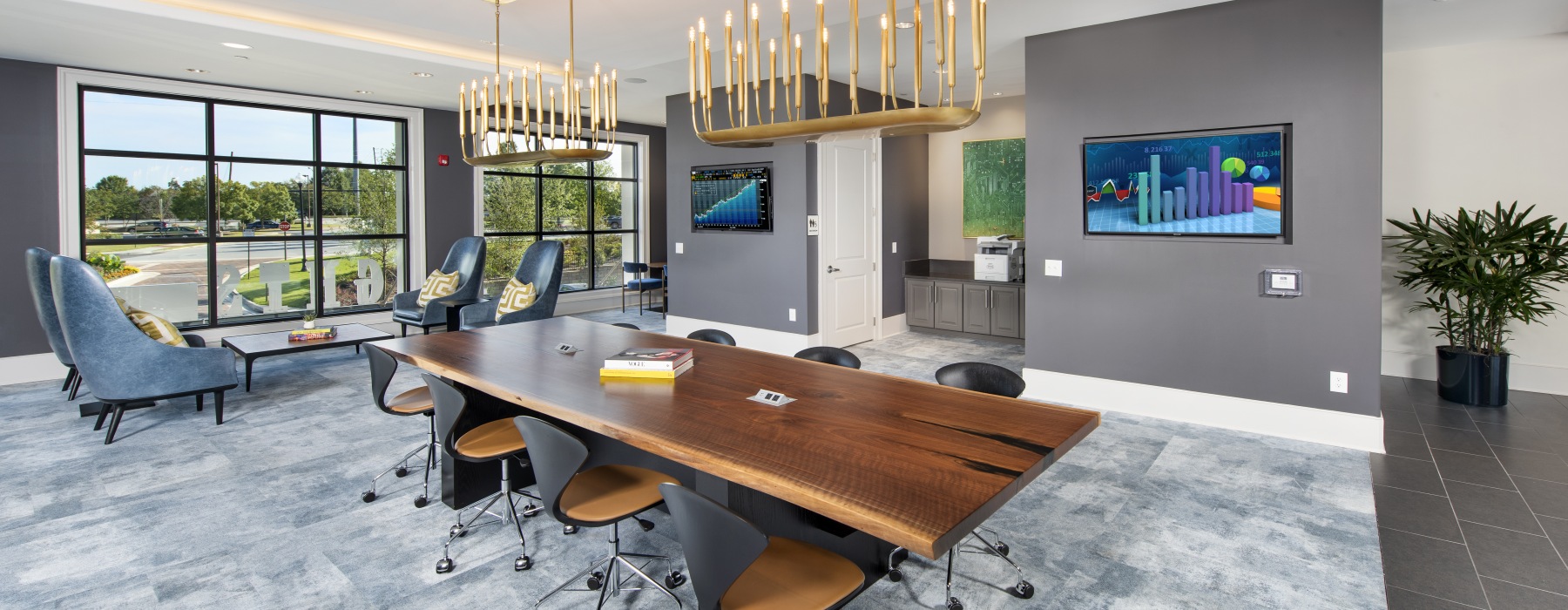 Resident coworking and conference lounge at Ten45 Suwanee apartments in Suwanee, Georgia